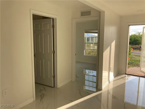 a view of a room with an empty space