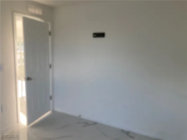 a view of a window in an empty room