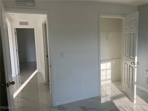 a view of a room with racks on the wall