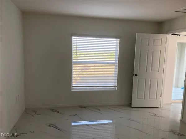 an empty room with a window