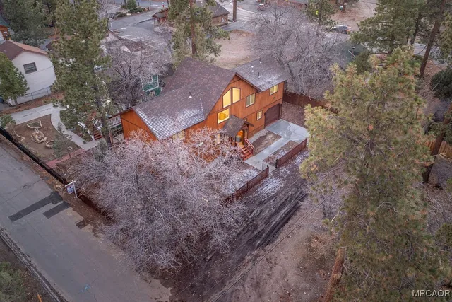 an aerial view of residential house with outdoor space