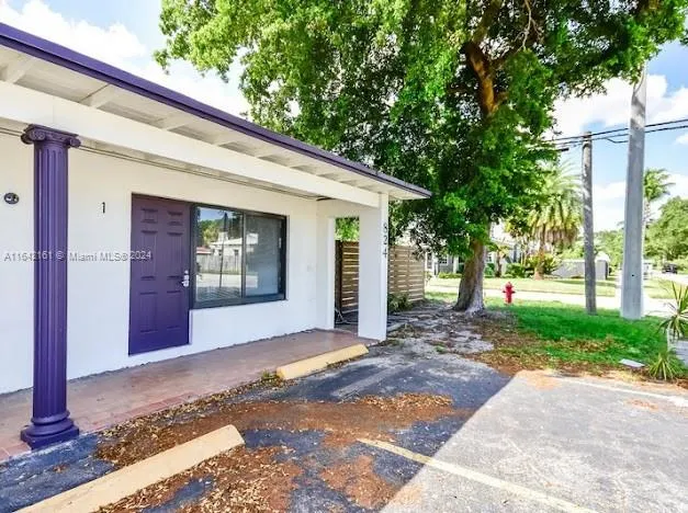 a view of a livingroom with furniture and window