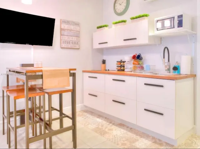 a living room with a couch and a table