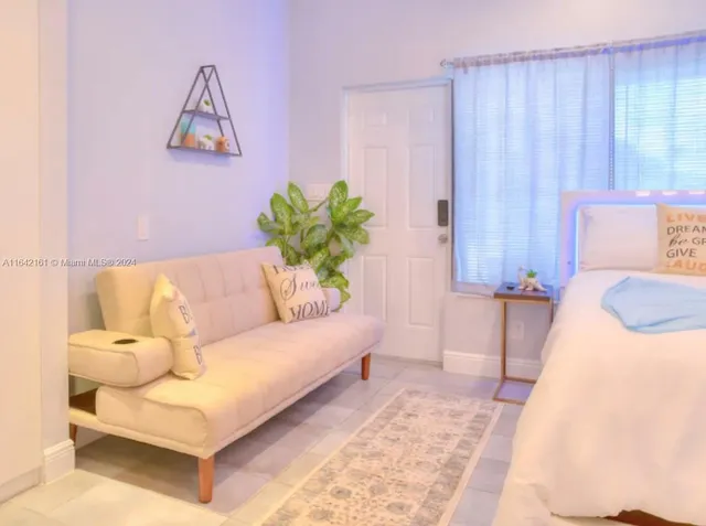 a room with sink and utility room view