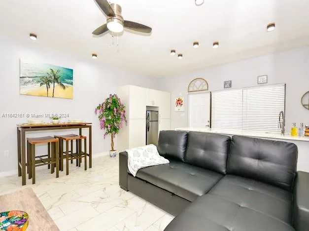 a view of a potted plant in front of a door