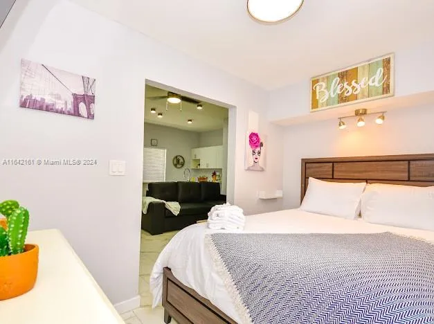 a view of a patio with couple of chairs