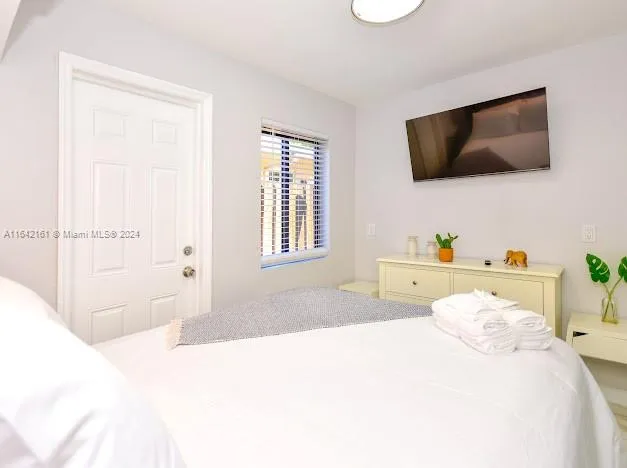 a view of a balcony with car parked