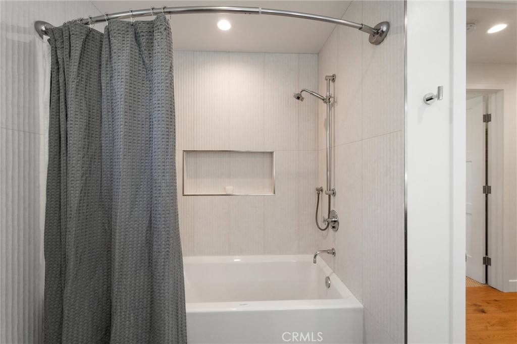 7337 La Soldadera Rancho Santa Fe, CA 92067 - Photo 29 of 60 a bathroom with a shower and a bath tub