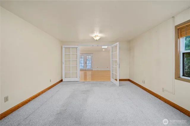 an empty room with windows