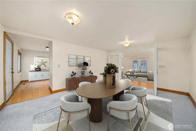 a living room with furniture and a table