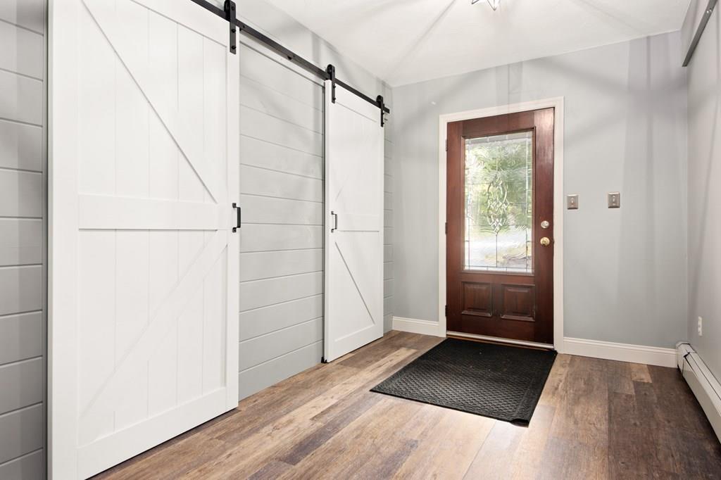12 South Road Exeter, NH 03833 - Photo 5 of 42 a view of entryway with wooden floor