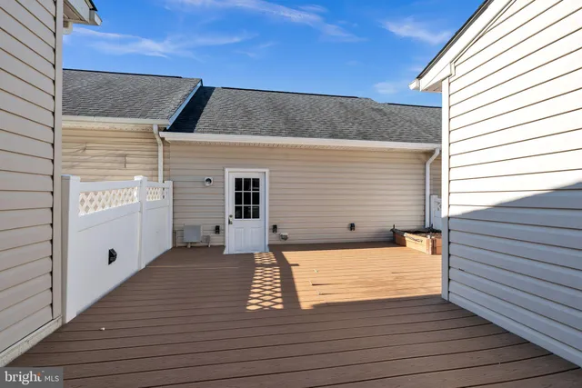 a view of a backyard with a door