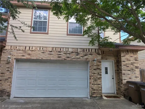 a front view of a house with a tree