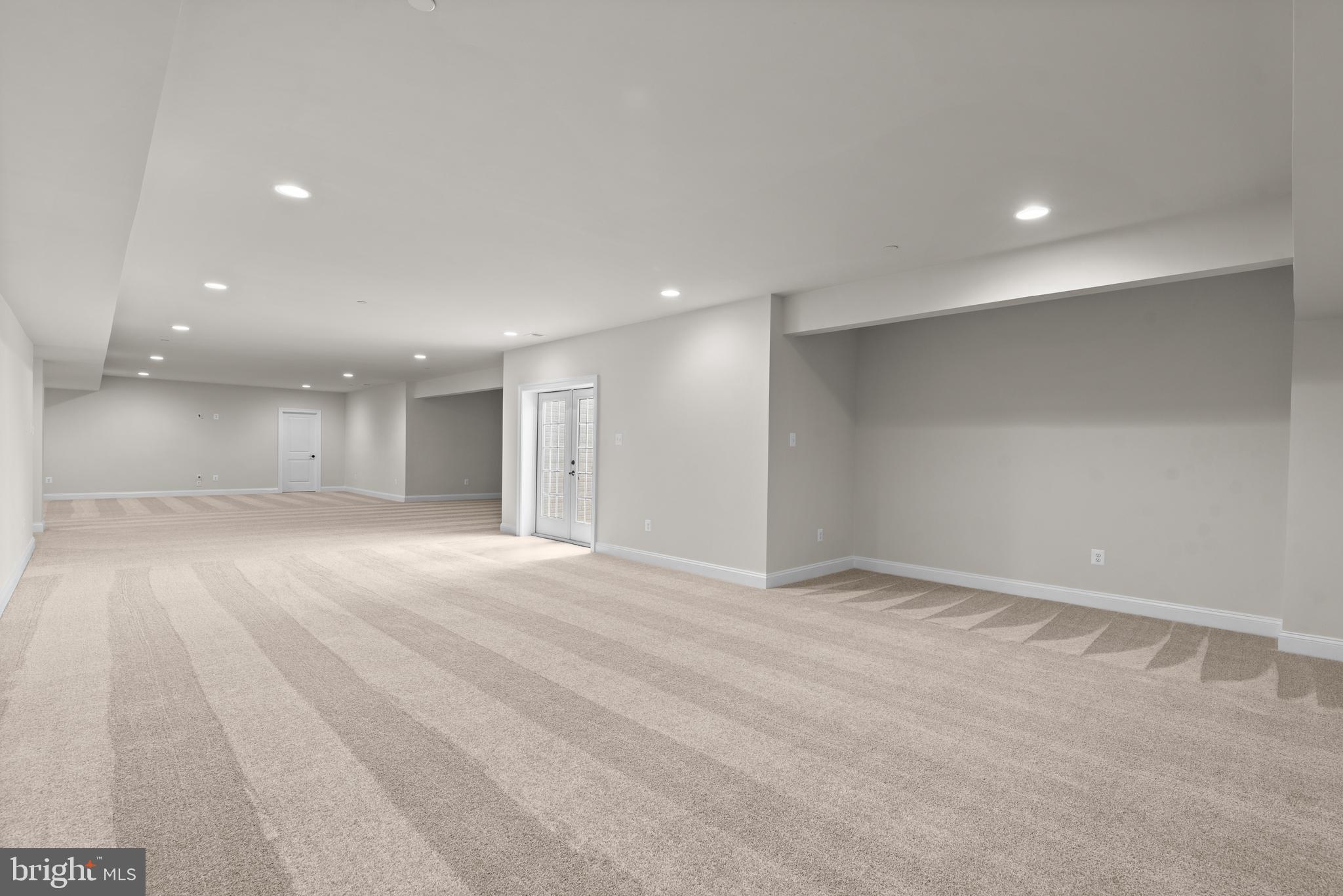 2 Hoffman Mill Road, Unit REGINA Hampstead, MD 21074 - Photo 55 of 69 an empty room with an entryway