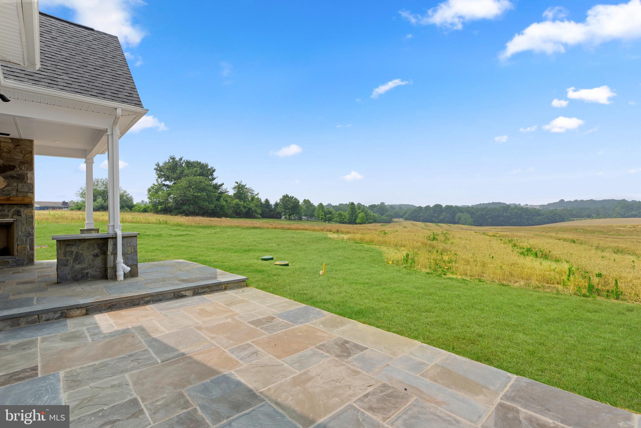 2 Hoffman Mill Road, Unit REGINA Hampstead, MD 21074 - Photo 59 of 69 a view of a lake with a big yard and potted plants