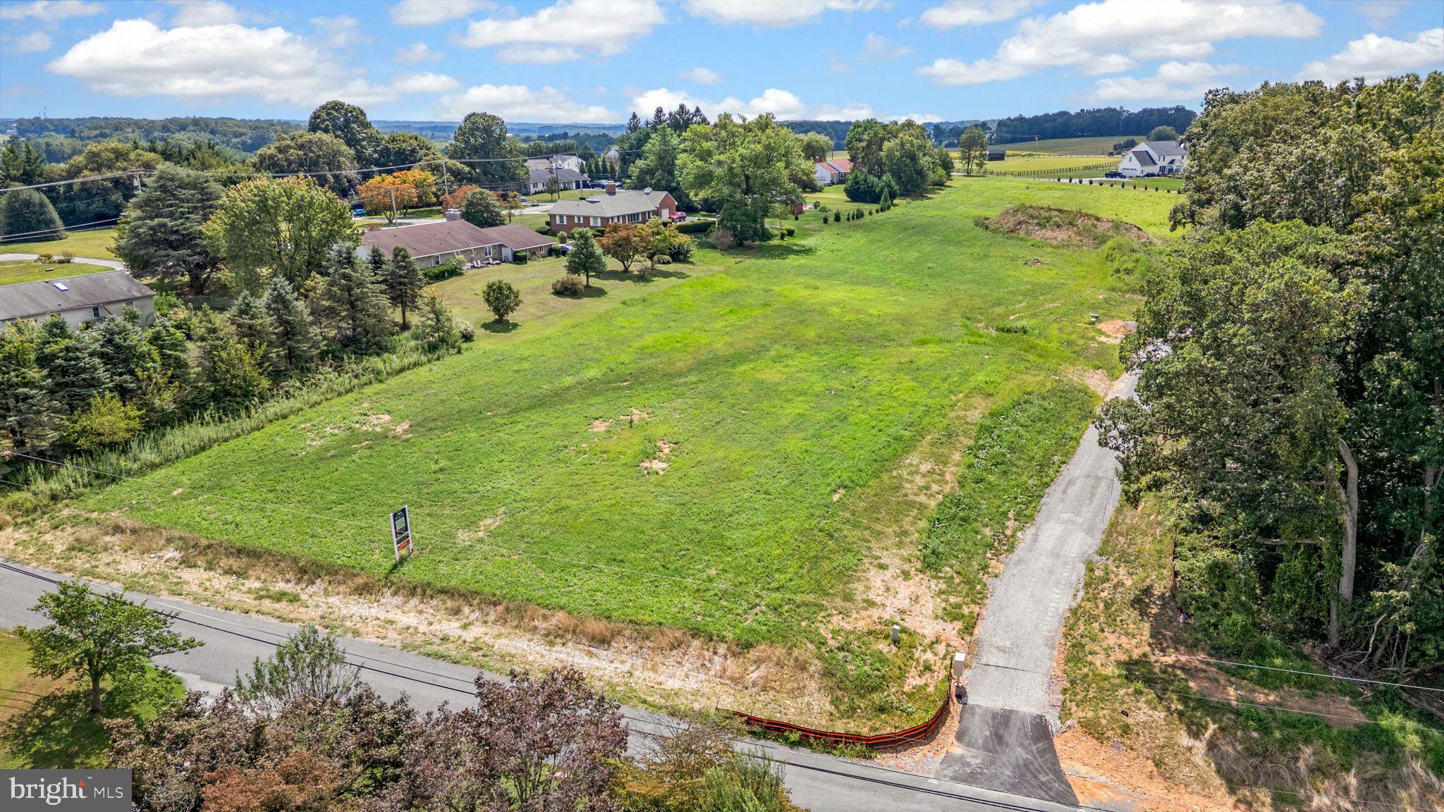 2 Hoffman Mill Road, Unit REGINA Hampstead, MD 21074 - Photo 68 of 69 a view of a garden with an outdoor space