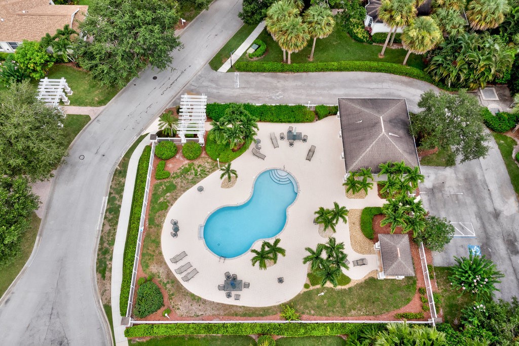 3812 Kitty Hawk Lane Southwest Vero Beach, FL 32968 - Photo 30 of 36 an aerial view of a house with a swimming pool