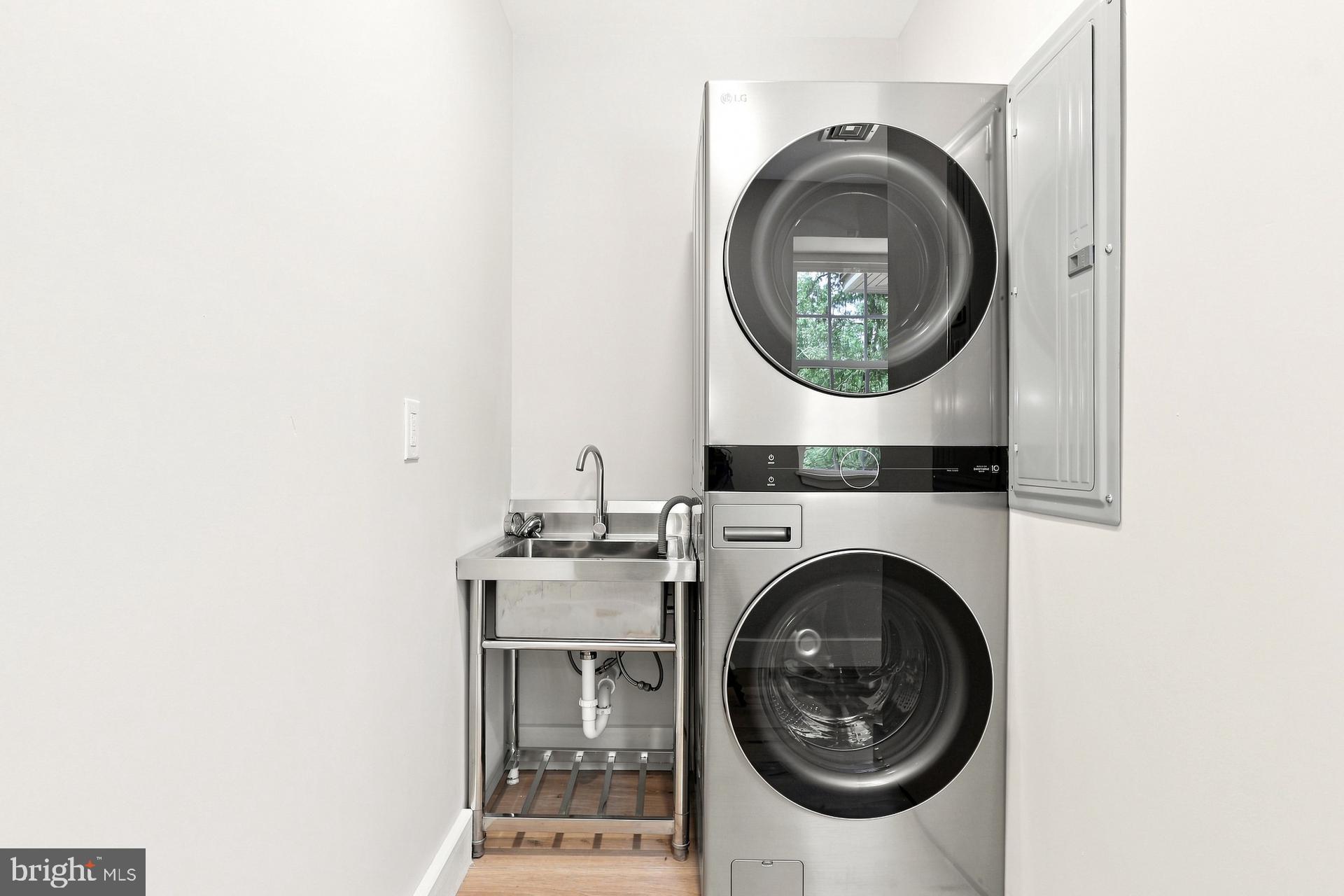 5565 Pennell Road Aston, PA 19014 - Photo 15 of 15 Sleek laundry space with modern appliances.