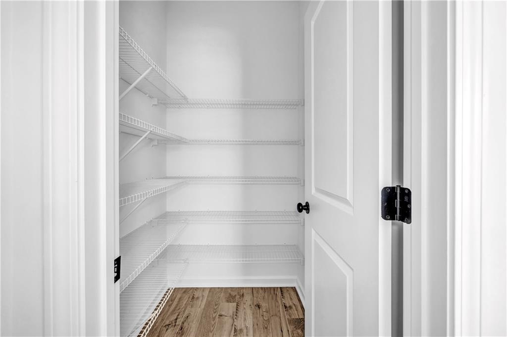 5772 Schelton Place Mableton, GA 30126 - Photo 13 of 24 a view of a walk in closet