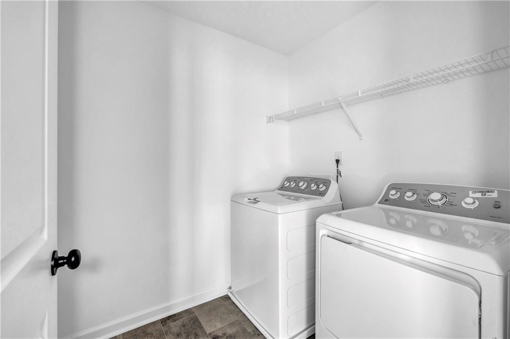 5772 Schelton Place Mableton, GA 30126 - Photo 14 of 24 a utility room with dryer and washer