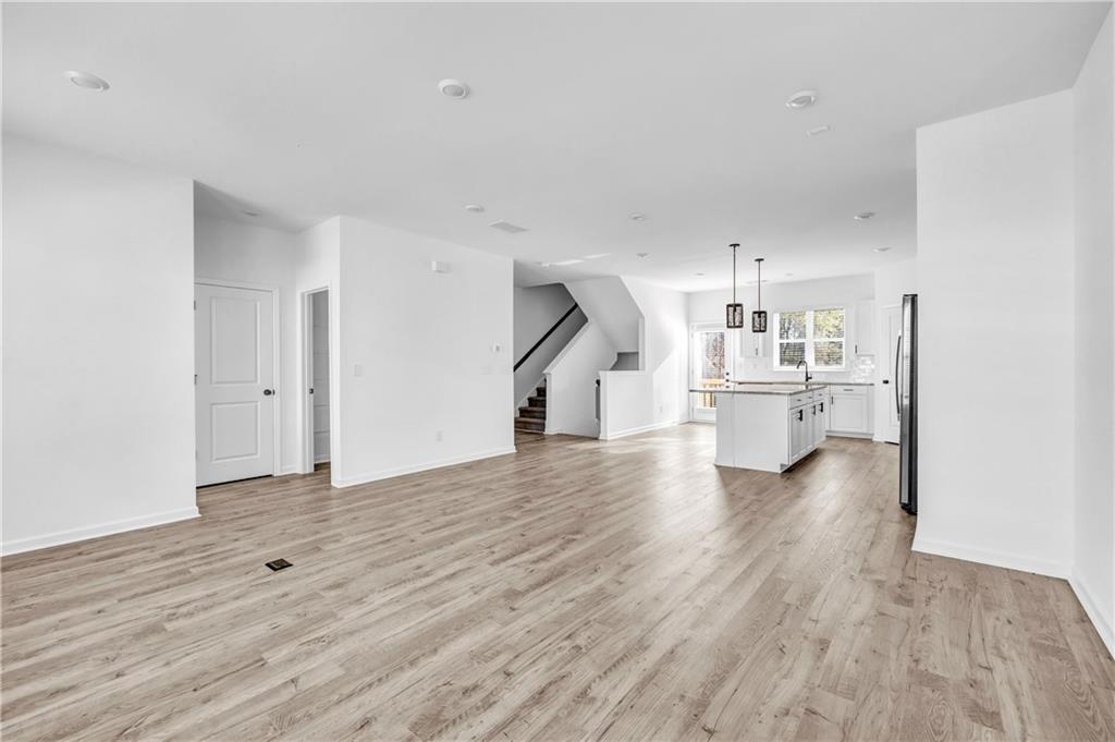 5772 Schelton Place Mableton, GA 30126 - Photo 6 of 24 a view of empty room with wooden floor