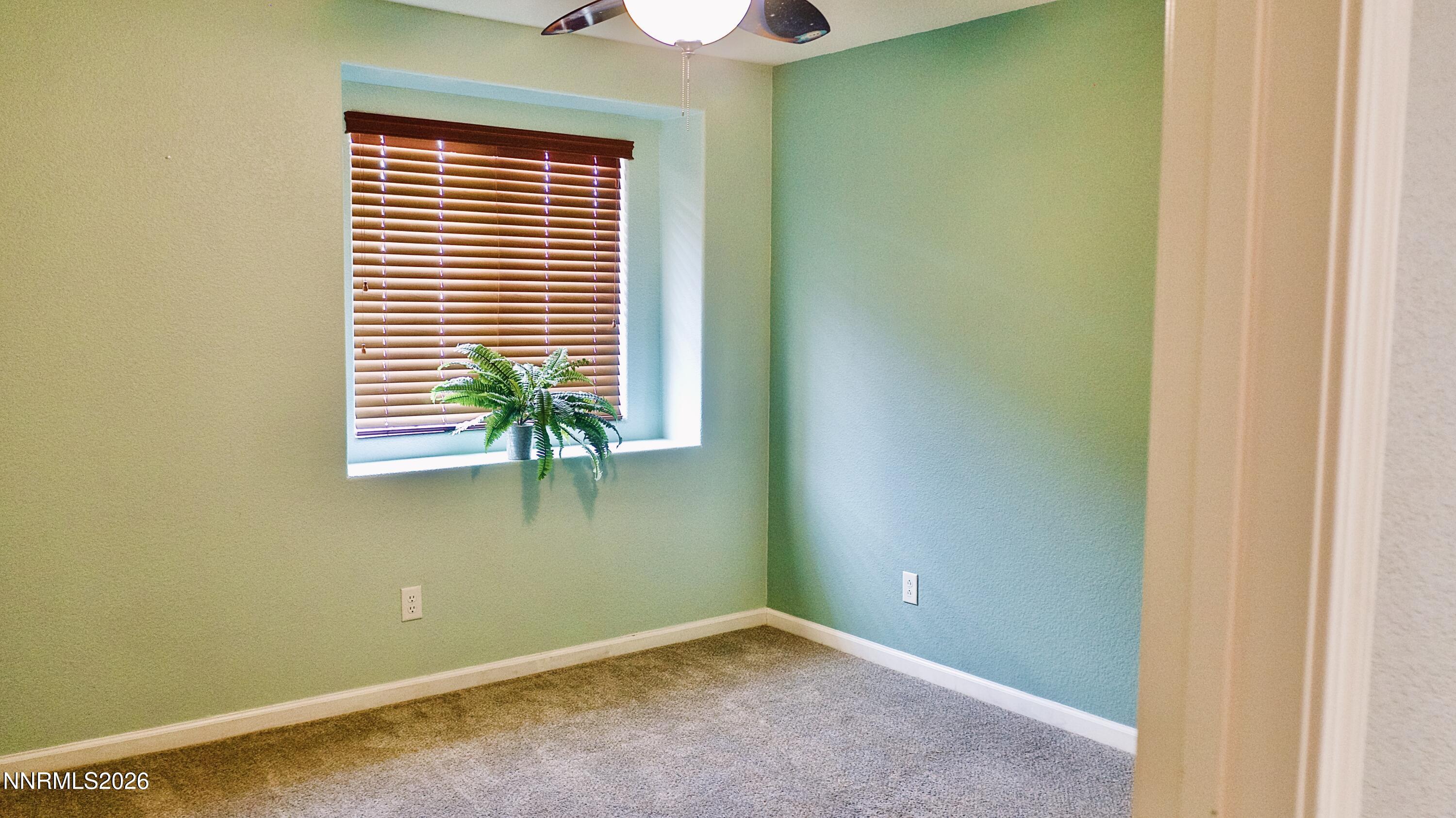 11590 Rivolli Court Reno, NV 89521 - Photo 12 of 22 a view of a room that has a window in it