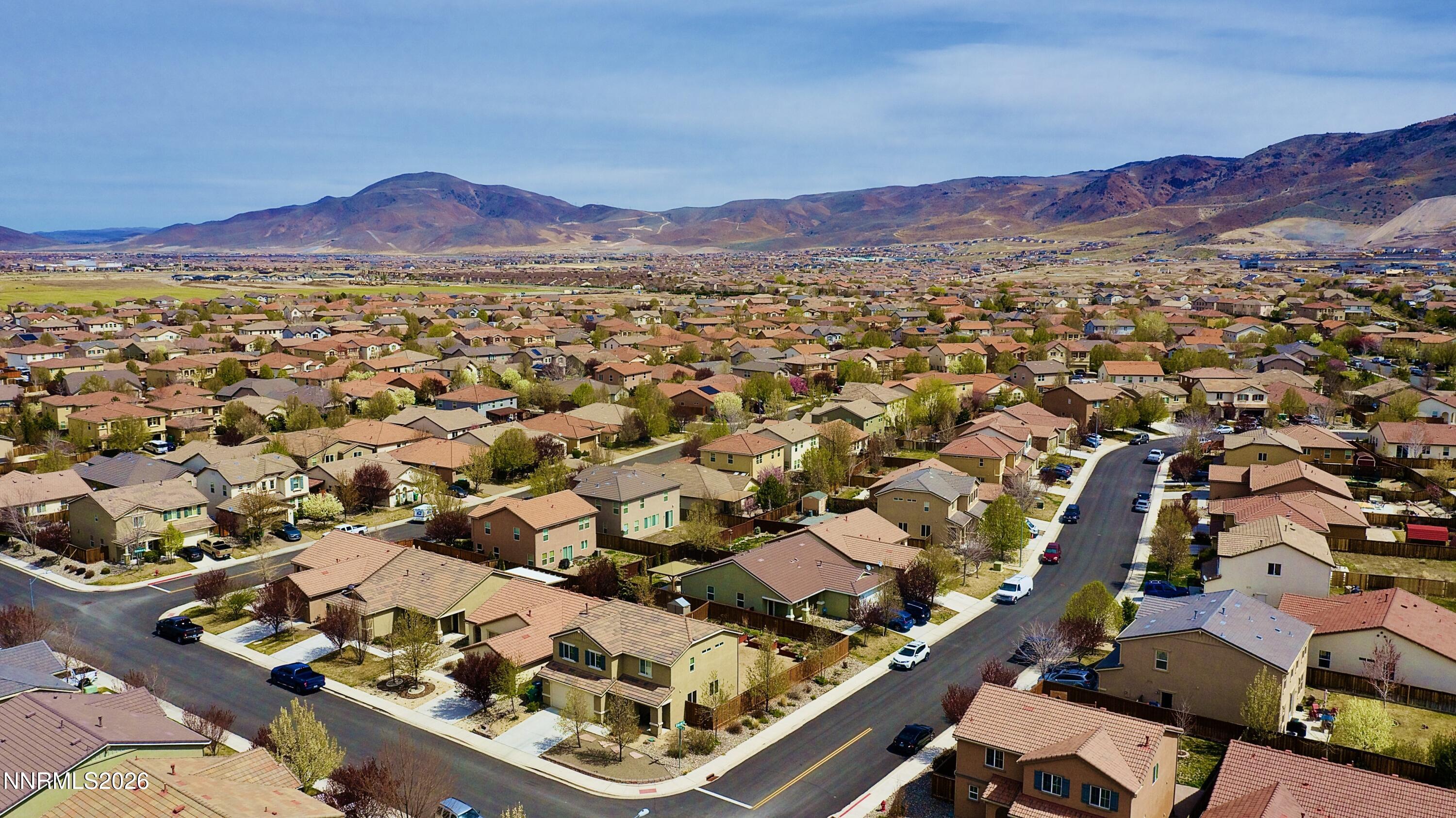 11590 Rivolli Court Reno, NV 89521 - Photo 21 of 22 an aerial view of residential houses with outdoor space