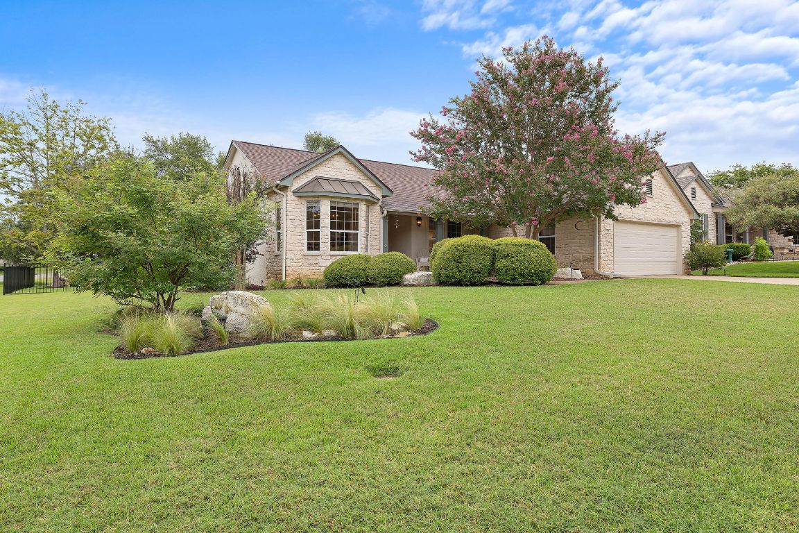 Located on a corner lot that is beautifully landscaped and fenced.