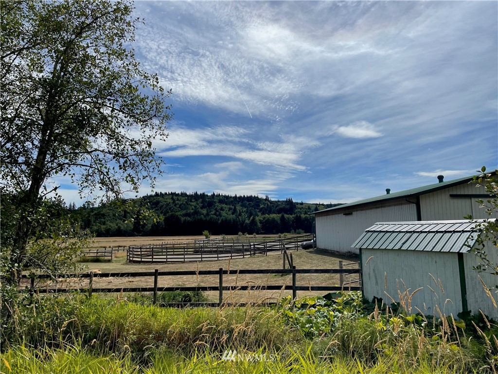 404 Independence Road Rochester, WA 98579 - Photo 13 of 40 a front view of a house with a garden