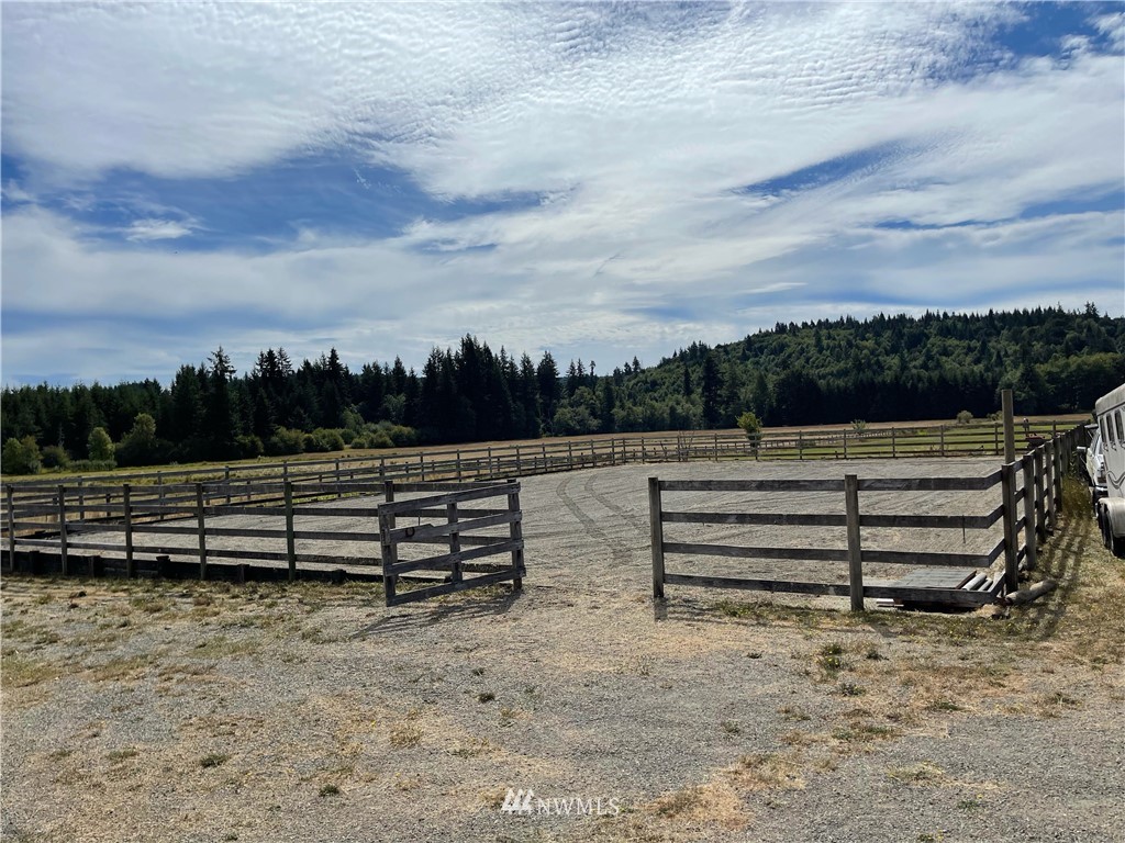 404 Independence Road Rochester, WA 98579 - Photo 7 of 40 a view of outdoor space with wooden benches