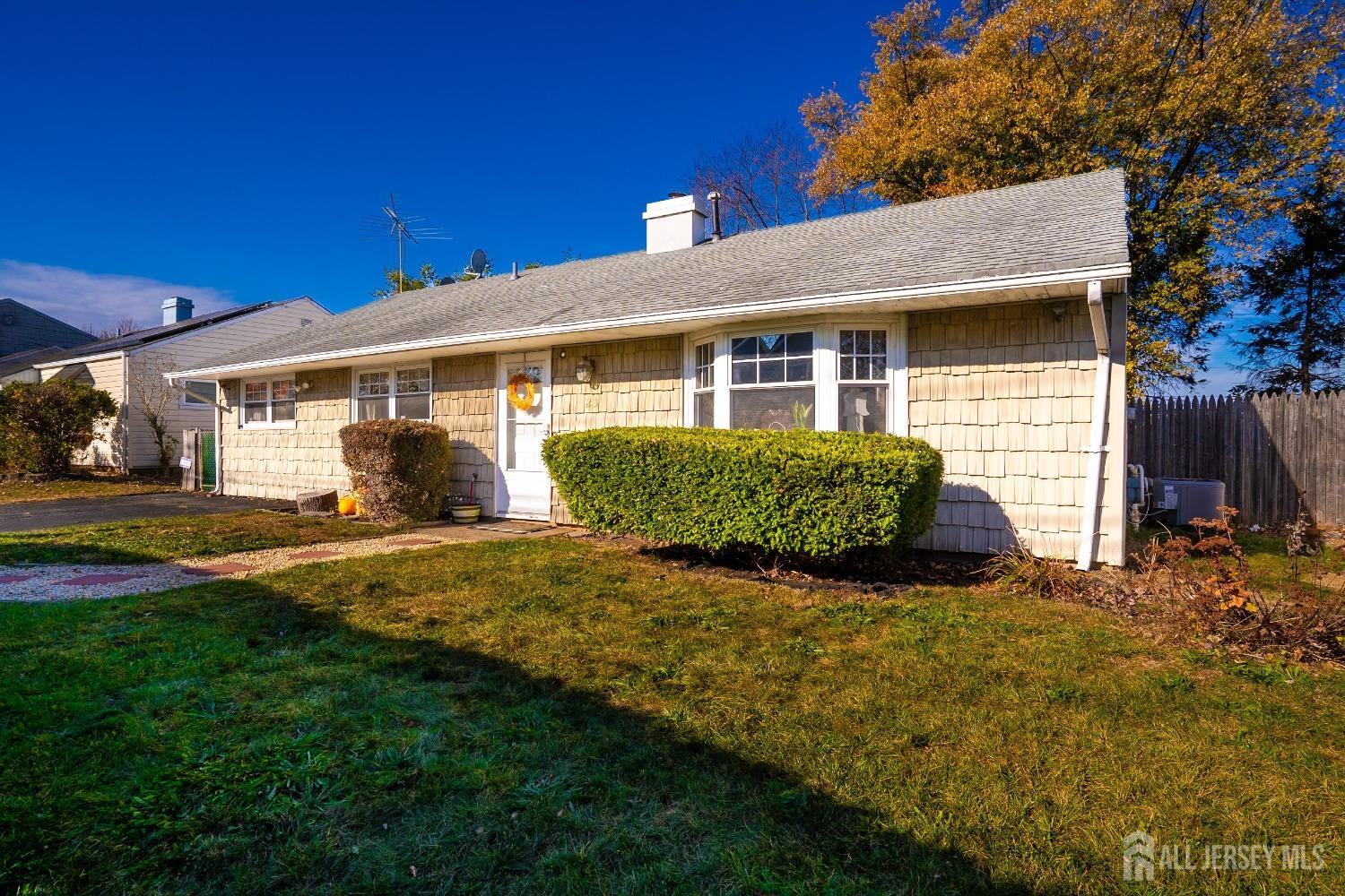 23 Winthrop Road Edison, NJ 08817 - Photo 1 of 29 a view of a yard in front of a house