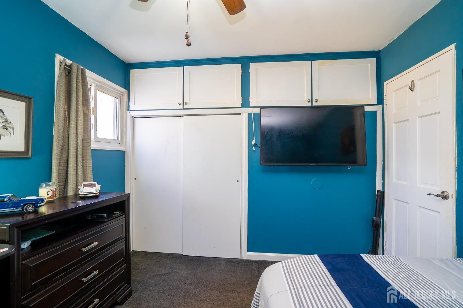 23 Winthrop Road Edison, NJ 08817 - Photo 13 of 29 a bedroom with a bed and a window
