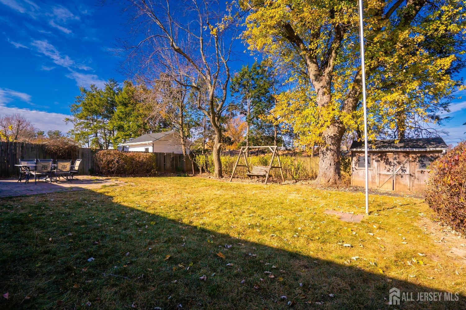 23 Winthrop Road Edison, NJ 08817 - Photo 14 of 29 a view of yard with swimming pool and sitting area