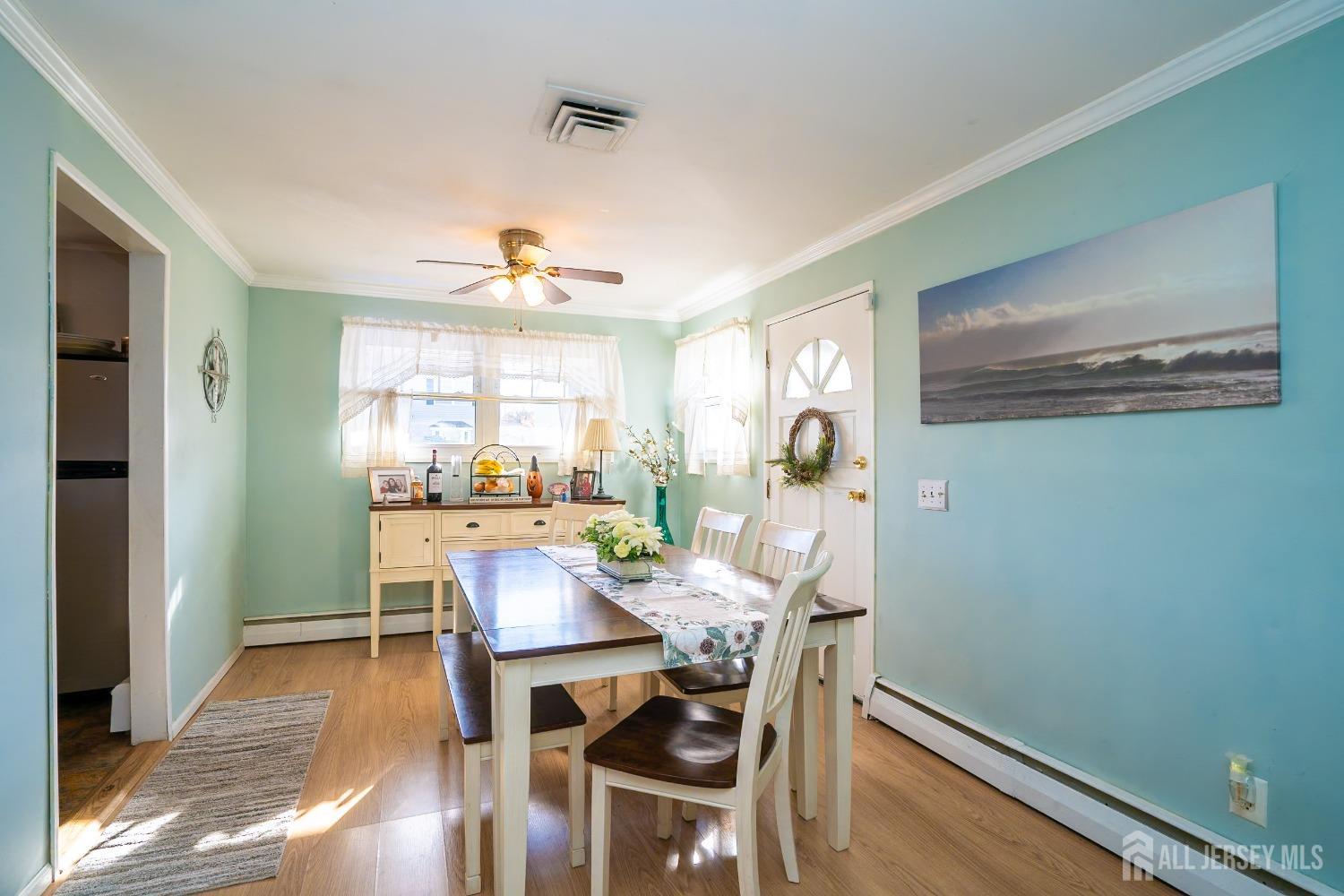 23 Winthrop Road Edison, NJ 08817 - Photo 4 of 29 a view of a dining room with furniture window and wooden floor