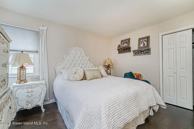 a view of walk in closet with clothes
