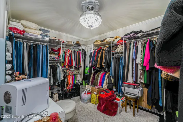 a view of a backyard with sitting area