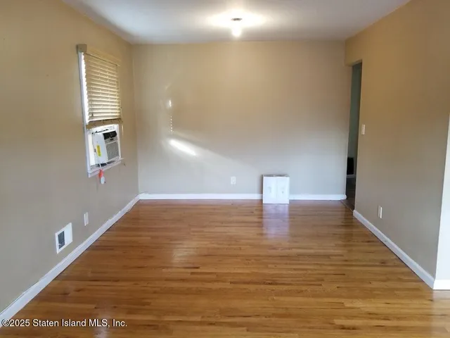 a kitchen with cabinets and appliances