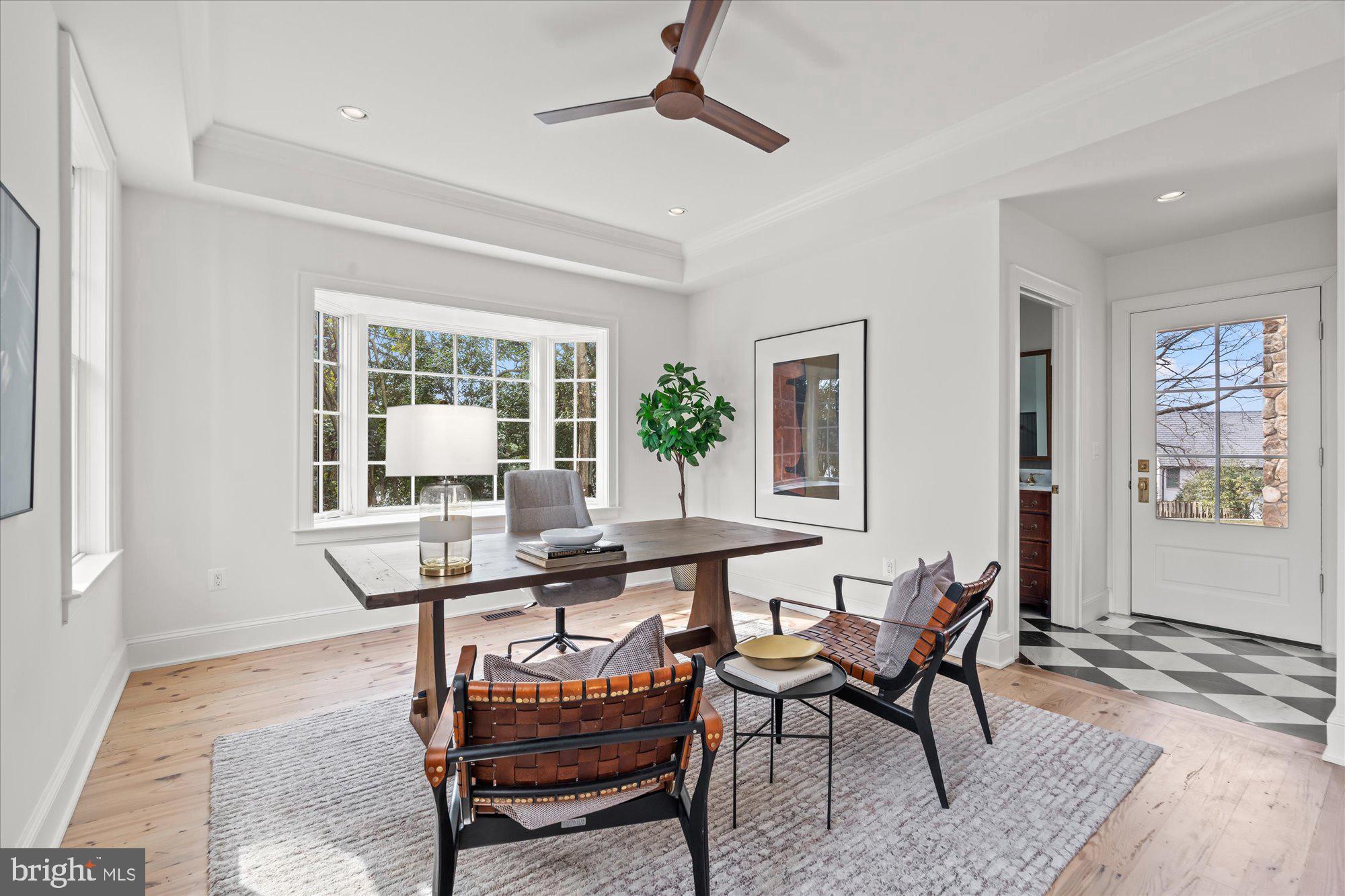 3612 North Glebe Road Arlington, VA 22207 - Photo 16 of 83 a view of a workspace and dining room with furniture window and wooden floor