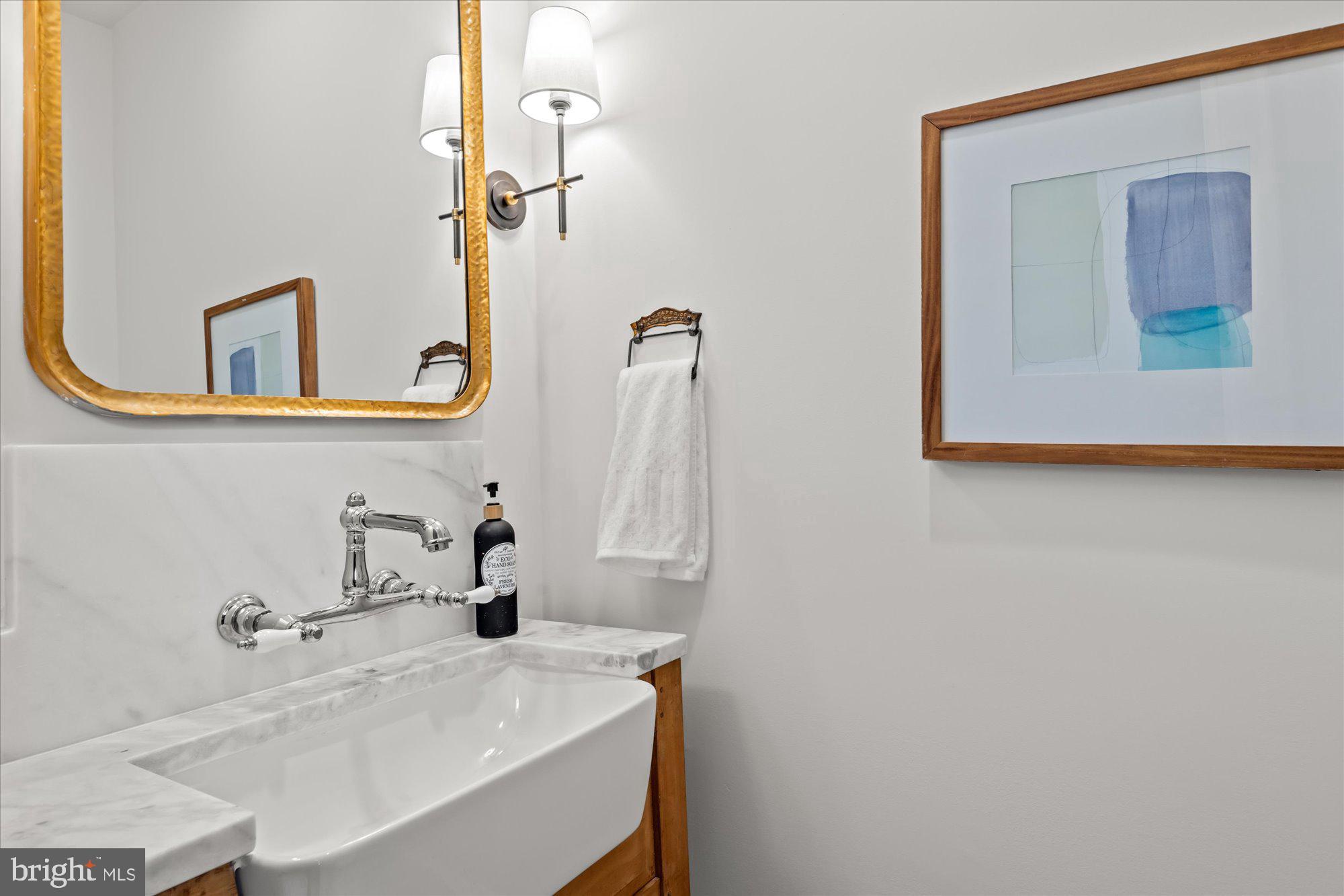 3612 North Glebe Road Arlington, VA 22207 - Photo 40 of 83 a bathroom with a sink and a mirror