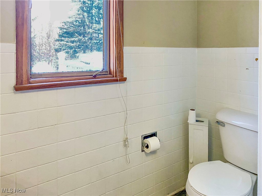 1034 Straub Road West Mansfield, OH 44904 - Photo 13 of 27 Bathroom featuring tile walls and toilet