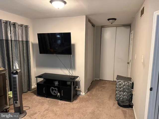 a kitchen with granite countertop a stove and a sink