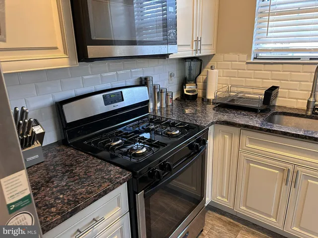 a view of hallway with walk in closet