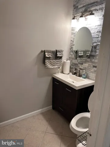 a kitchen with granite countertop white cabinets and granite counter tops