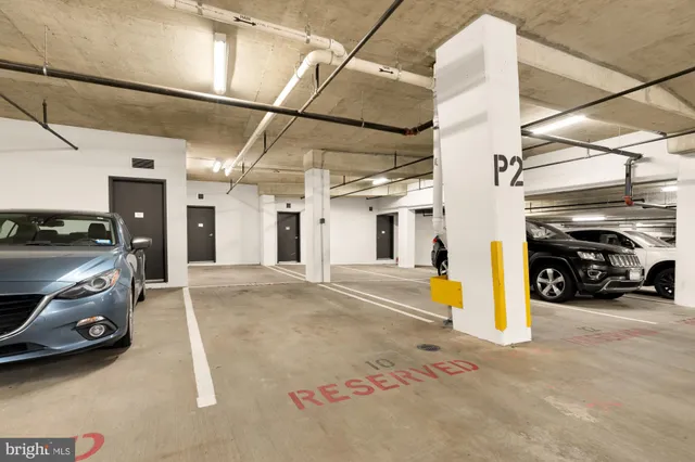 a view of a cars park in front of house