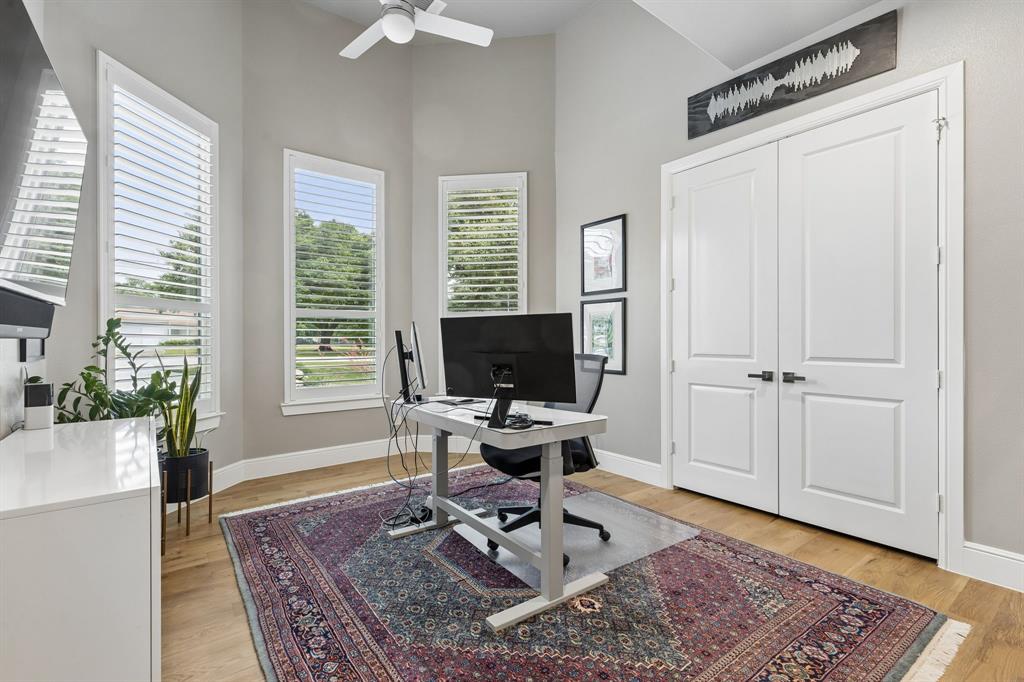 6700 Herbert Road Colleyville, TX 76034 - Photo 10 of 32 a work room with furniture wooden floor and windows