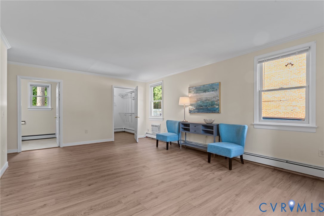 4804 Morrison Road Richmond, VA 23230 - Photo 23 of 48 a living room with furniture and a wooden floor