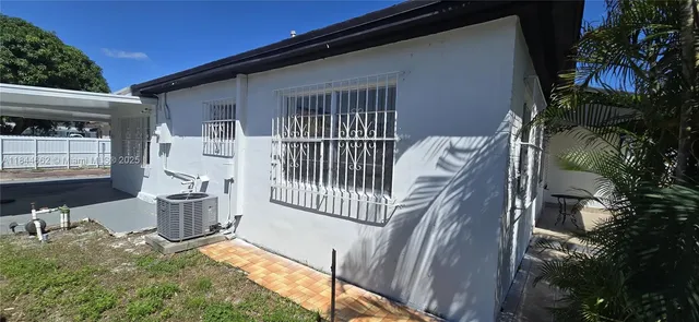 a view of a back yard of the house