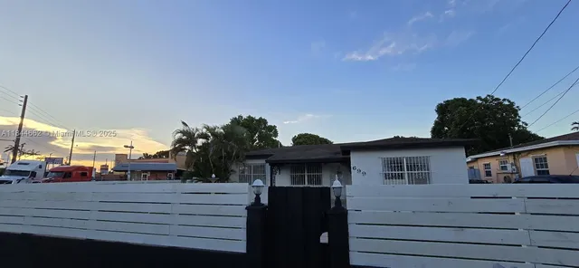 a view of house with outdoor space