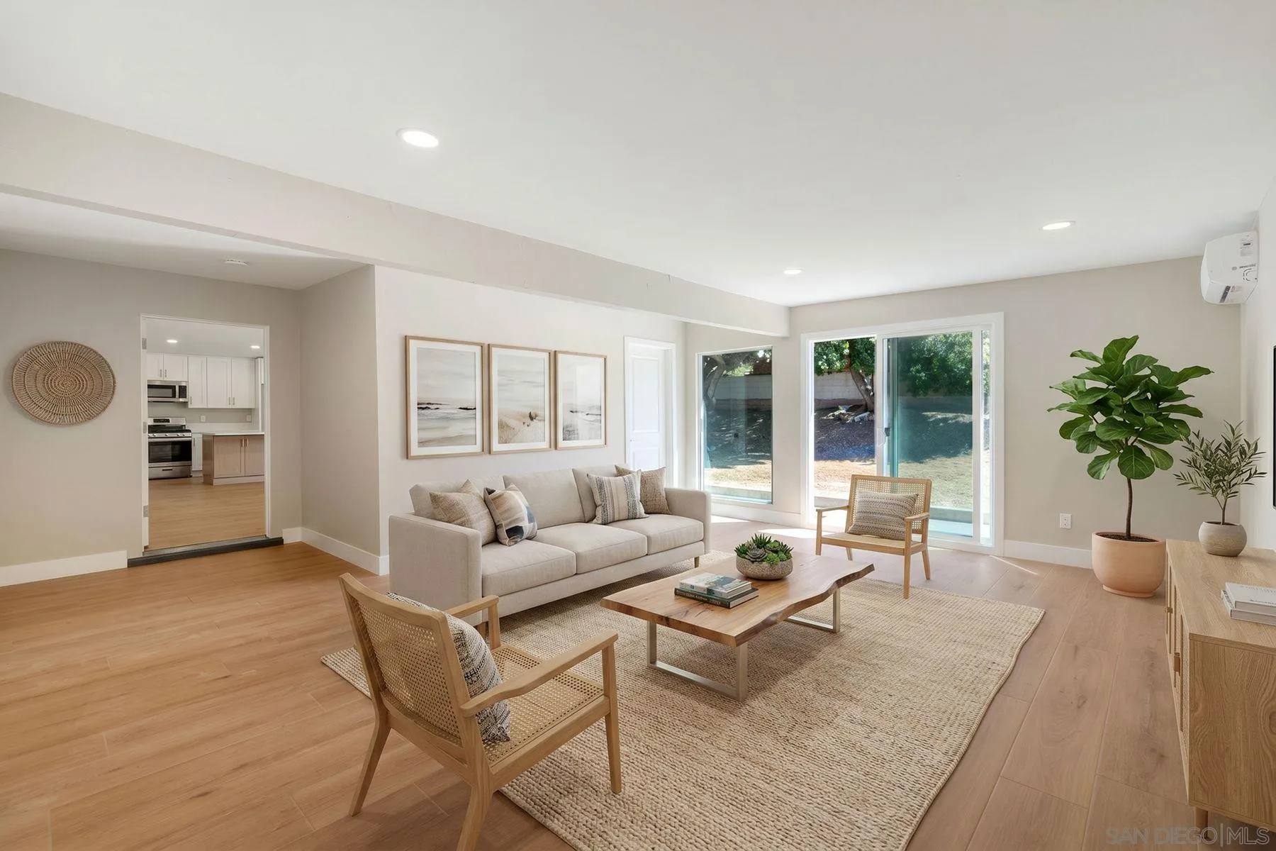 578 East Indian Rock Road Vista, CA 92084 - Photo 2 of 30 a living room with furniture and large windows
