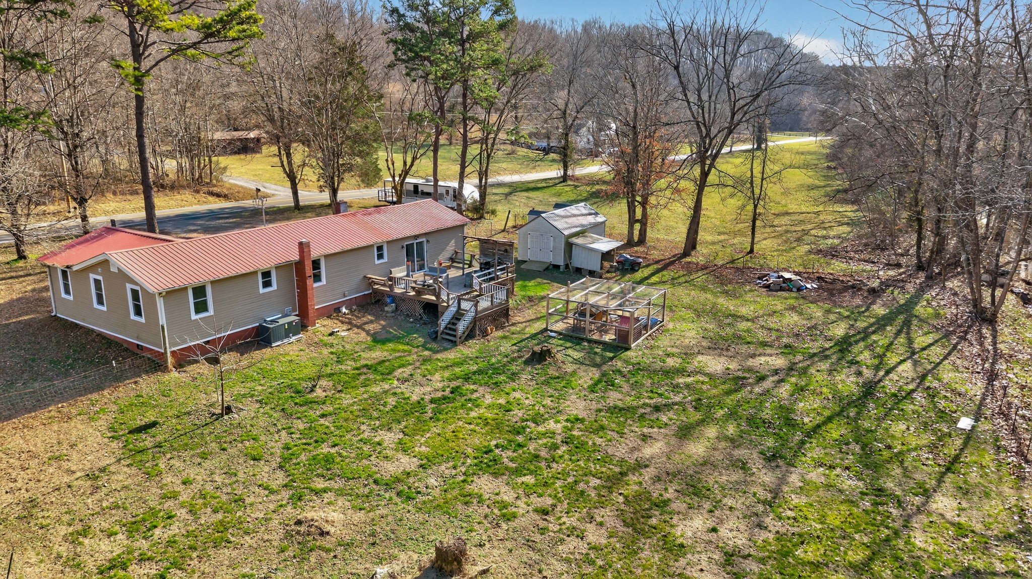 3332 Abednego Road Greenbrier, TN 37073 - Photo 75 of 86 a view of a house with a yard and sitting area